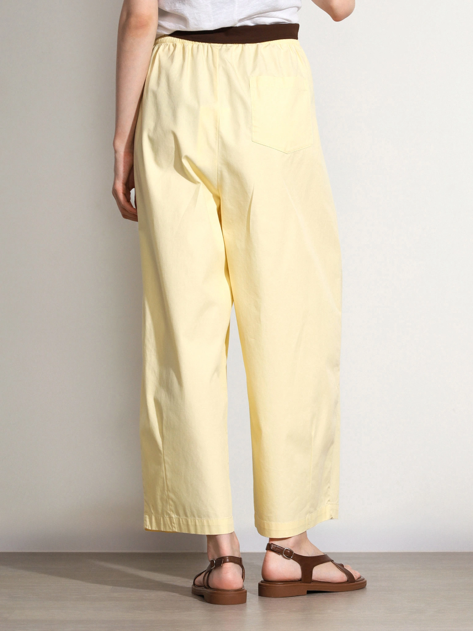 Брюки желтого цвета из смесового хлопка